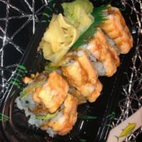 Tiger Roll( 8 Piece) · crabmeat, avocado, cucumber, crunchy wrapped with shrimp , eel sauce and spicy mayo sauce.