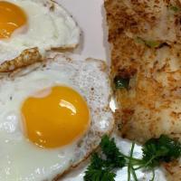 Two Eggs Any Style · All eggs and omelettes are served with potatoes or grits and toast.