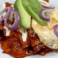 Chilaquiles Rojos Or Verdes · Fried tortilla strips simmered in red or green salsa, served with two eggs any style.