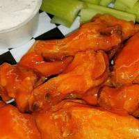 Buffalo Wings · Honey mild or hot bbq served with celery and blue cheese.