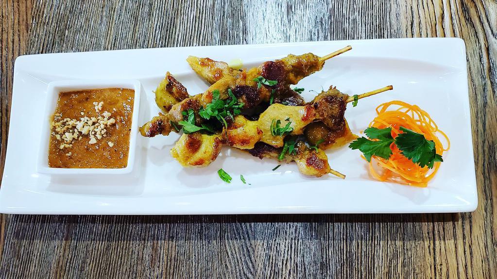 Chicken Wings · Thai marinated wings served with sweet chili sauce