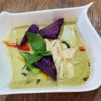 Green Curry · Spicy. Green curry paste, coconut milk, bamboo, basil, eggplant, long hot peppers.
