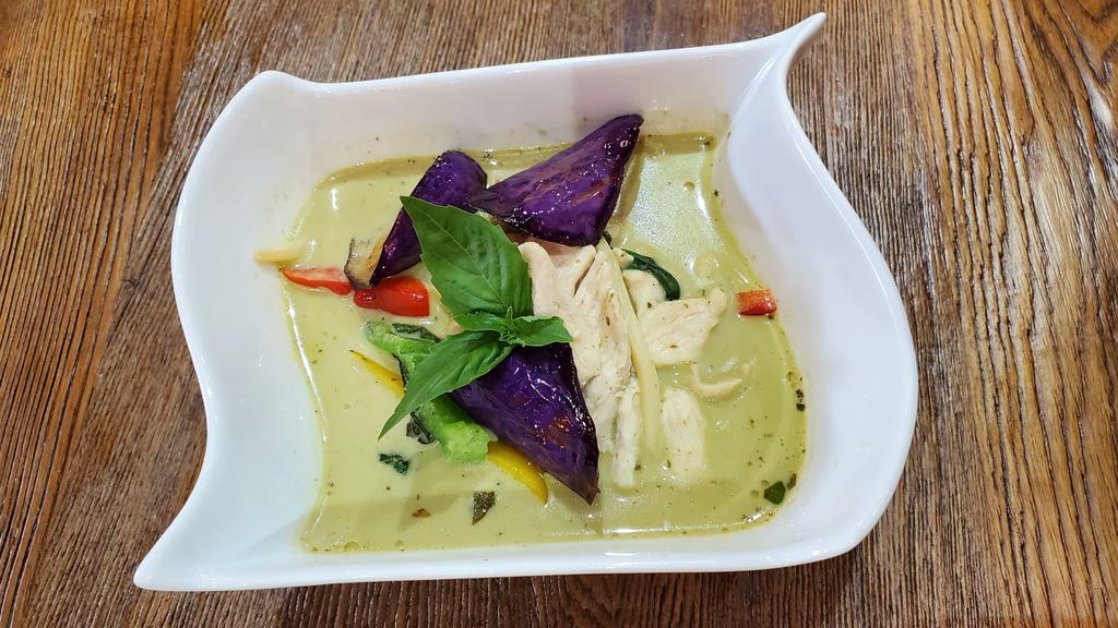 Green Curry · Spicy. Green curry paste, coconut milk, bamboo, basil, eggplant, long hot peppers.