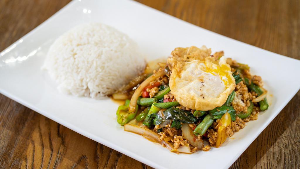 Thai Basil Chicken  · Spicy. Ground chicken, basil, Thai chili, onion, scallion, mixed bell peppers, fried egg