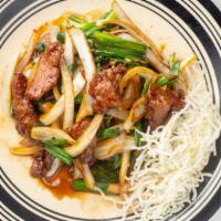 Mongolian Beef · Hot and spicy. Sliced beef with ginger and scallions in a black pepper sauce.