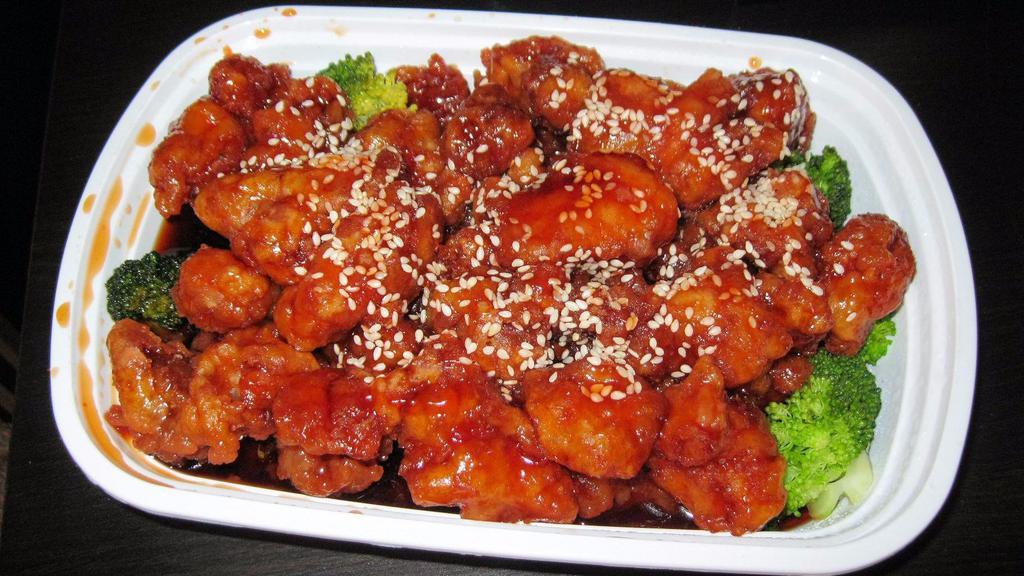 H 1. Sesame Chicken · Tender chunky chicken meat, marinated, fried till crispy served with sesame sauce.
