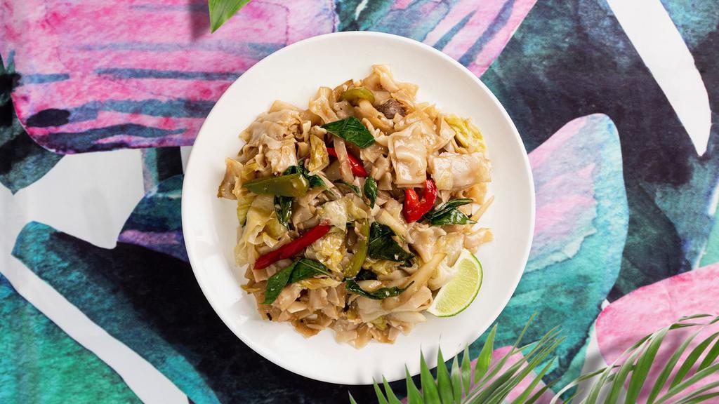Drunken Noodles · Flat rice noodles, served with tomatoes, onions, bell peppers and fresh chiles with your choice of tofu or vegetables.