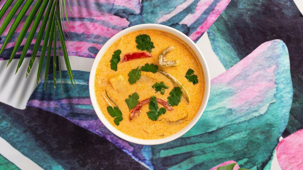 Red Curry · Coconut cream, kaffir lime, sweet basil curry with your choice of tofu or vegetables.