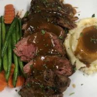 Grilled Beef Medallions · Sliced Beef Medallions Served with Mashed Potatoes, Sautéed Veggies,Mushrooms, Onions & Mush...