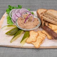 Chicken Liver Paté · With rye bread,crackers, raw onions, and pickles.