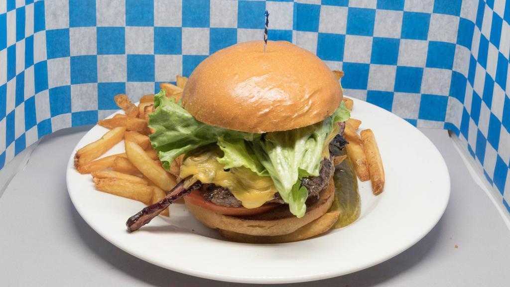 Oktoberfest Burger · On a fresh-baked brioche roll with bacon, cheese, sautéed mushrooms and onions, lettuce, and tomato.