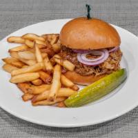 Bbq Pulled Pork · Slow-cooked and juicy barbecue with red onions on a brioche bun.