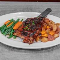 Bbq Pork Ribs Entree · Slow cooked, tender and juicy, smothered in our house BBQ sauce. Add pulled pork for an addi...