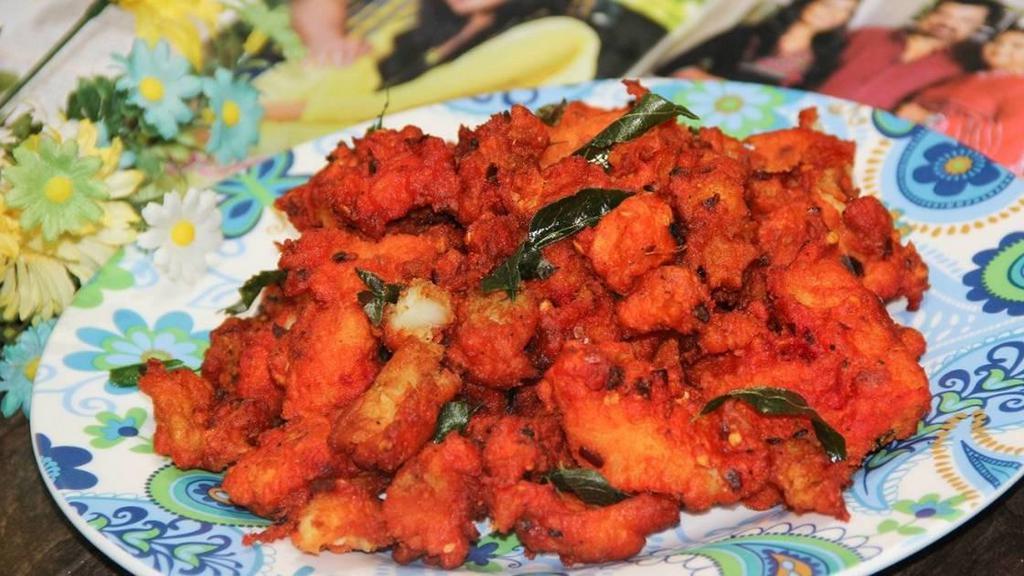 Fish Pakoda · Slices of fish marinated with gram flour mix with Indian spices, deep fry till perfection.
