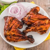 Tandoori Chicken · GLUTEN FREE - Baby chicken half/full marinated in yogurt and chef special spices cooked in a...