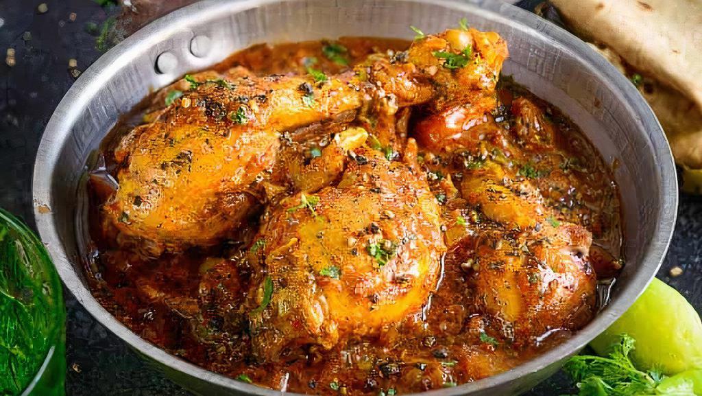 Chicken Chettinad · GLUTEN FREE - Chicken marinated in yogurt, a paste of fresh coconut, cumin powder, and other chef made spices, cooked on slow heat to give lip-smacking flavors.