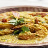 Kerala Paratha With Shrimp Curry · A layered flaky flatbread 2pc, serves with chef special shrimp curry.