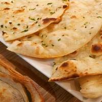 Chili Garlic Naan · Made with whole wheat flour mix with milk and salt stuffed with chili, and garlic.