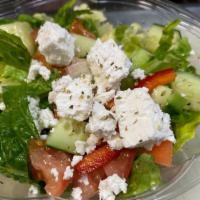 Greek · Romaine lettuce, tomato, red onions, olives, capers and feta with extra virgin olive oil and...
