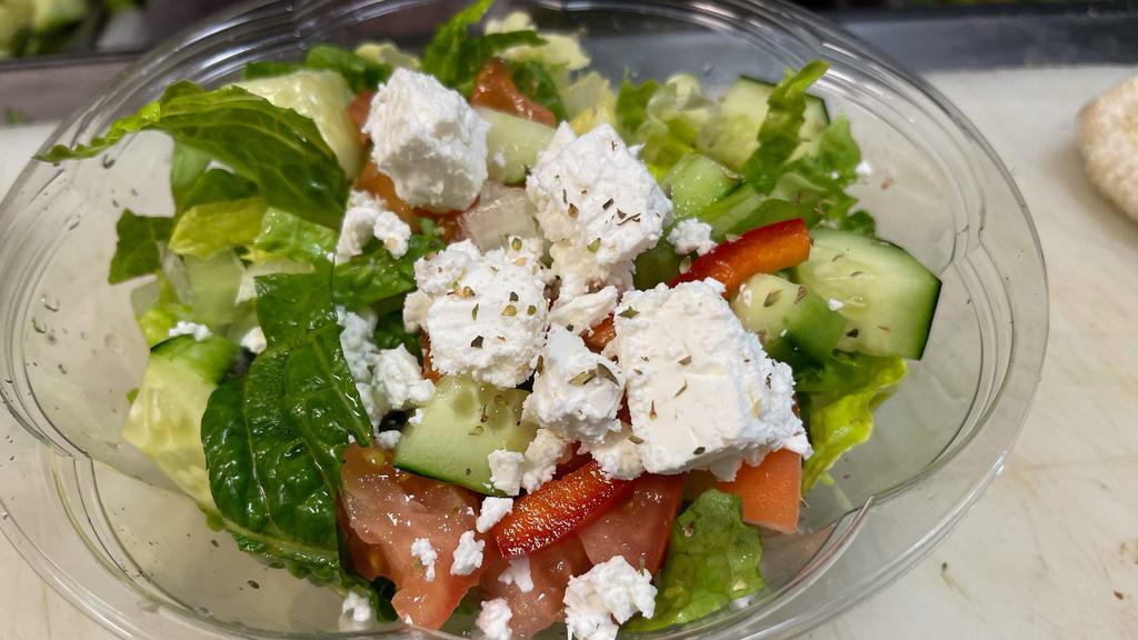 Greek · Romaine lettuce, tomato, red onions, olives, capers and feta with extra virgin olive oil and red wine vinegar.