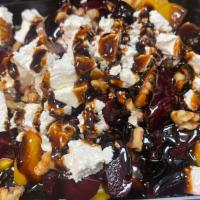 Beet Salad · Roasted red and yellow beets with feta and toasted walnuts with extra virgin olive oil and b...