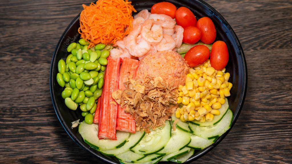 Cosmo Bowl · Spicy tuna, crab meat, shrimp, cucumber, edamame, spicy mayo, yuzu dressing, sweet corn, carrot pickles, grape tomatoes, and crispy onions. Consuming raw or under cooked meats, fish or shellfish may increase your risk of food-borne illness, especially if you have certain medical condition.