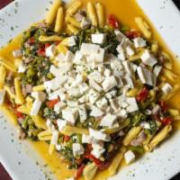 Cavatelli Guiseppe · Homemade cavatelli sauteed with broccoli rabe, sun-dried tomatoes & crumbled sausage in a ga...