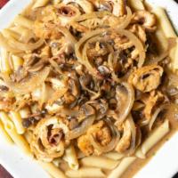 Chicken Rollatine · Chicken rolled with prosciutto & mozzarella sauteed in marsala wine sauce with mushrooms & o...
