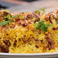 Goat Dum Biryani · Goat (with bone) cooked in basmati rice, over a low fire with Indian herbs