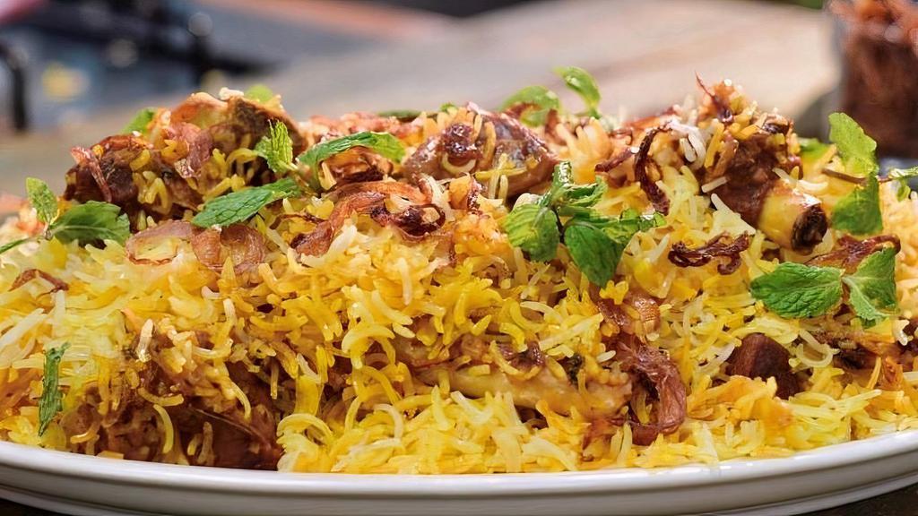 Goat Dum Biryani · Goat (with bone) cooked in basmati rice, over a low fire with Indian herbs