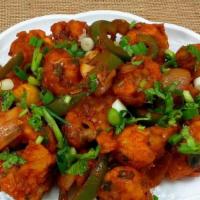 Chilly Gobi · Fried Cauliflower florets with diced bell pepper onion in a spicy chilly sauce.