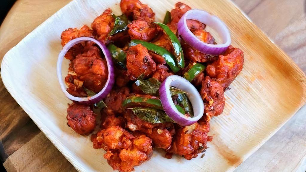 Gobi 65 · Cauliflower florets are marinated with Indian spices and fried to perfection.