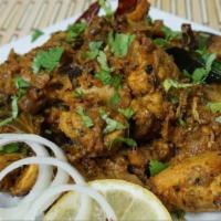 Chicken Sukka · Boneless chicken cooked in a traditional south Indian style.