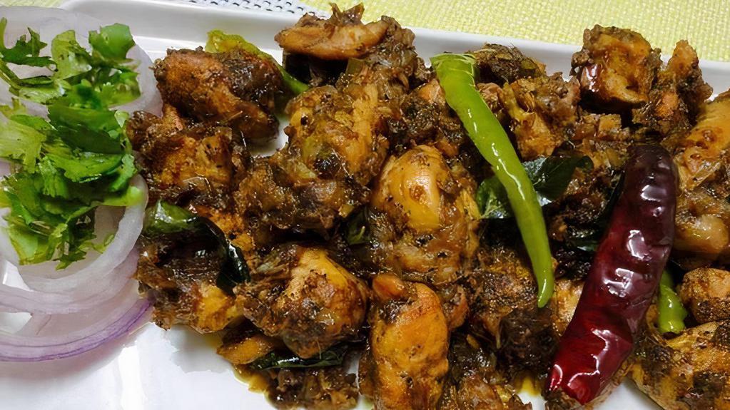 Chicken Pepper Fry · Boneless chicken marinated in crushed peppercorns fried with chopped onions and sauteed to perfection.