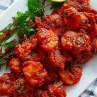 Shrimp 65 · Shrimp marinated in Indian spices along with yogurt and deep-fried to perfection.
