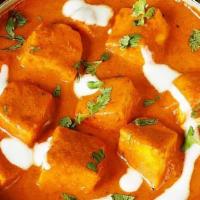 Paneer Makhani · Cottage cheese is delicately cooked on low heat and garnished with fresh cream.