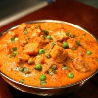 Mutter Paneer · Creamy North Indian dish cooked with cottage cheese and green peas in a creamy tomato-based ...