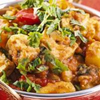 Veg Jalfreezi · Mixed vegetables cooked in a tomato-based sauce spiced up with green chillies, onions, ginge...