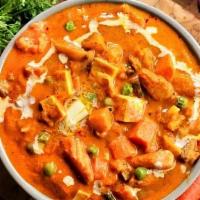 Vegetable Tikka Masala · Assorted vegetables cooked in a rich creamy tomato-based gravy.