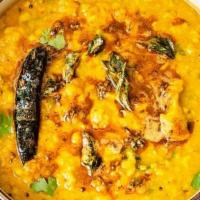 Dal Tadka · Popular Indian lentil dish tempered with mustard, cumin, garlic & curry leaves.