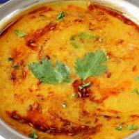 Dal Fry · Yellow lentils cooked to perfection with Indian herbs and spices.