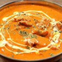 Butter Chicken · Boneless chicken cubes cooked in a creamy tomato sauce.