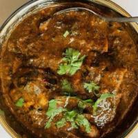 Gongura Chicken · Boneless Chicken cooked with Gongura leaves (sour leaves) based curry.