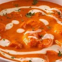 Shrimp Tikka Masala · Fresh shrimp, bell pepper, onion cooked in a hot and creamy tomato-based sauce.