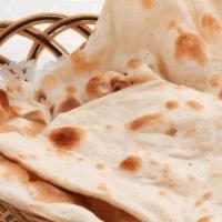 Plain Naan ( No Butter) · Traditional Indian bread with no butter baked in clay oven.