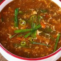 Chicken Hot And Sour Soup · Chicken Soup with hot chillies, ginger, carrot & vinegar.
