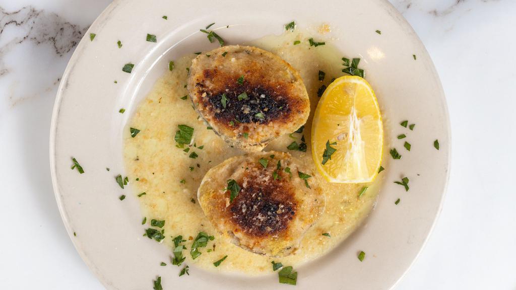 Baked Clams · Six pieces whole baked littleneck clams.