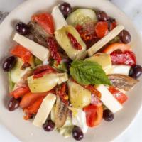 Cold Antipasto Salad · Tossed garden salad with salami, fresh cheeses, roasted peppers, marinated eggplant, and our...