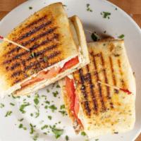 Grilled Chicken Panini · Grilled chicken, tomatoes, fresh mozzarella, and roasted peppers.