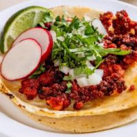 Chorizo Taco (Order Of 3) · Topped with cilantro, onions, lime wedge, radish. Choice of green, red or guacamole sauce.